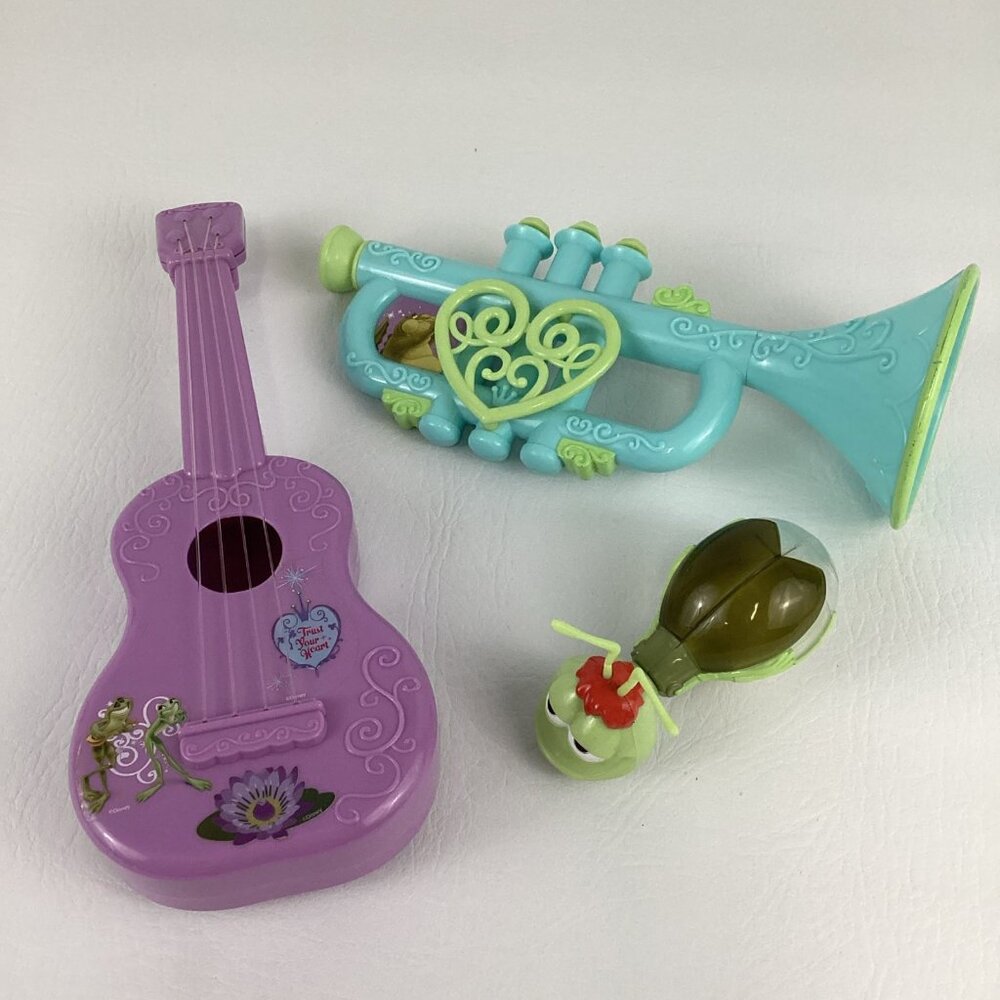 Disney Princess Frog Musical Instrument Lot Trumpet Ukulele Ray Firefly Shaker